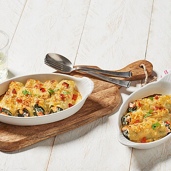 Cannelloni raffiniert gefüllt mit Spinat-Meerrettich-Crème und Lachswürfeln. 