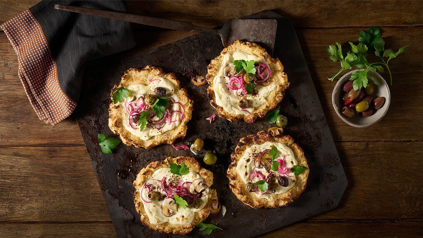 Blumenkohl-Pizza mit Champignons