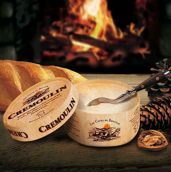 Crémoulin Weichkäse am Feuer